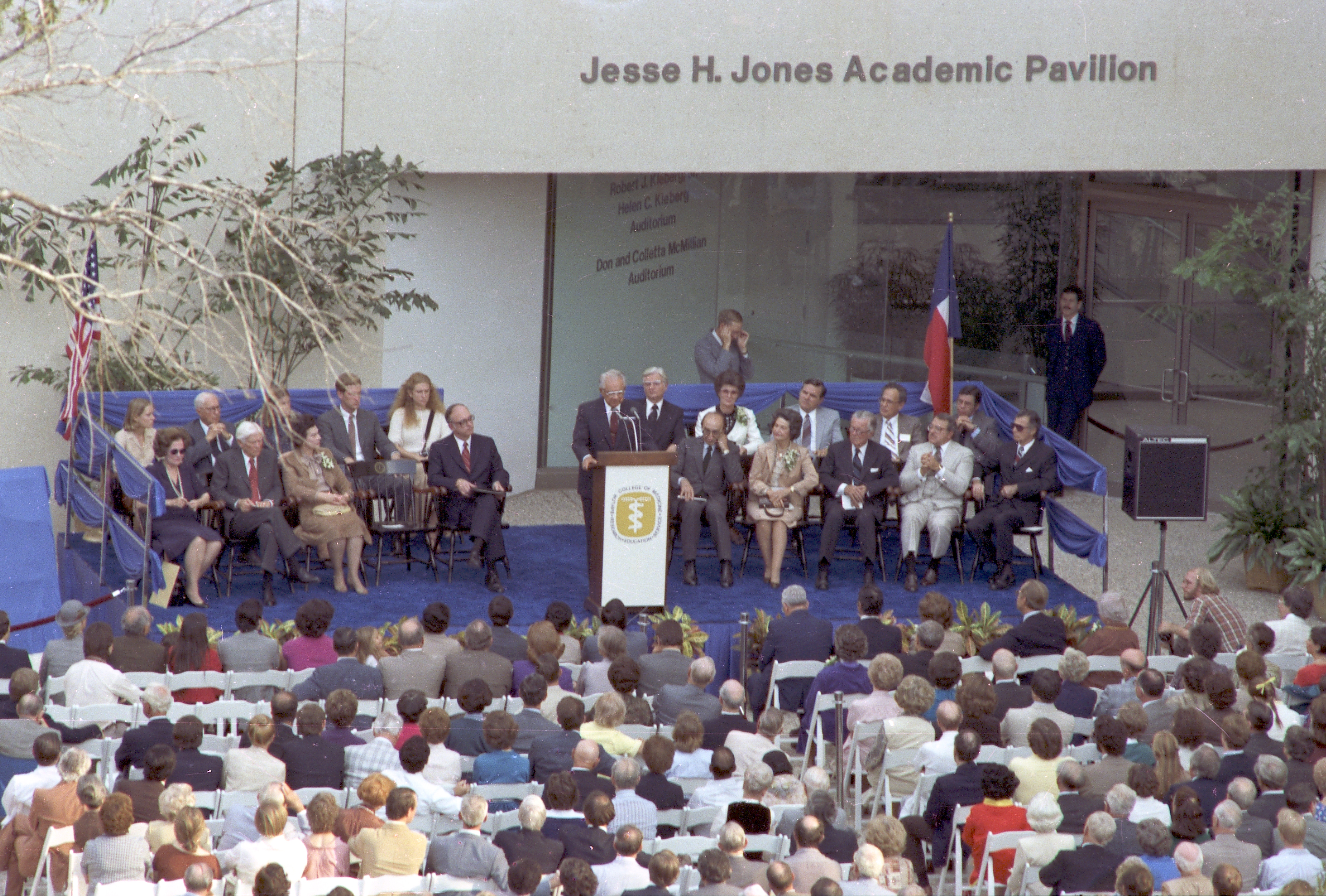 Leon Jaworski spoke at the dedication of the Michael E. DeBakey Center for Biomedical Education and Research. Platform guests, front row, left to right, Mary Lasker, George R. Brown, Jo Murphy, William T. Butler, Michael E. DeBakey, Lady Bird Johnson, Leonard F. McCollum, Julius C. Pericola, Henry J.N. Taub; back row, Emory G. Alexander, Herman P. Pressler, Helenita Alexander, John D. Alexander, Jr., Henrietta Alexander, B.J. Martin, Colletta McMillian, Don McMillian, Harris Busch, Jerry Lewis. Photo courtesy Baylor College of Medicine Archives.