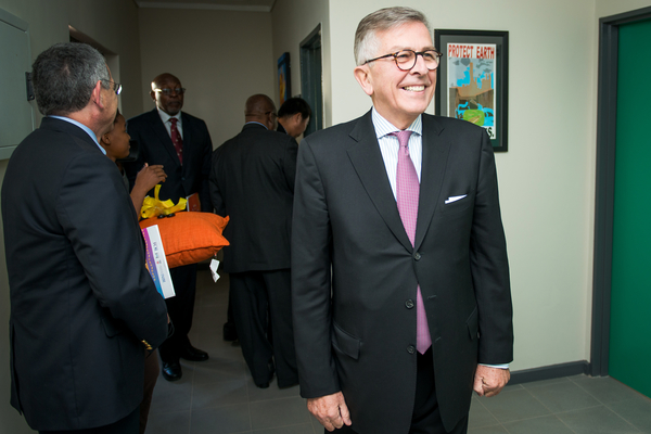 Lamberto Andreotti, CEO of Bristol-Myers Squibb, tours the new adolescent building. (Photo by Smiley N. Pool)