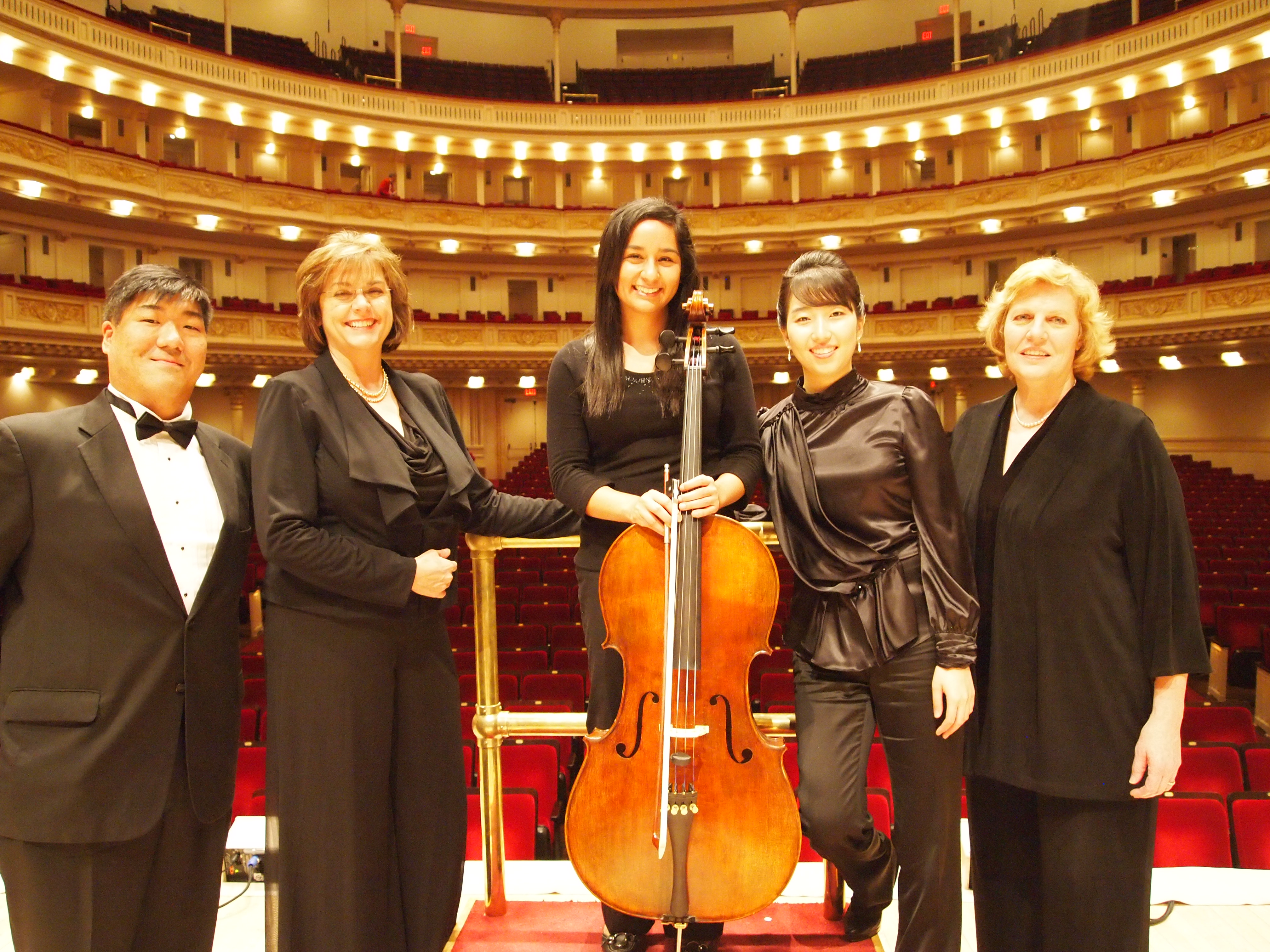 Effie Rahman with some of the other members of the orchestra’s cello section.