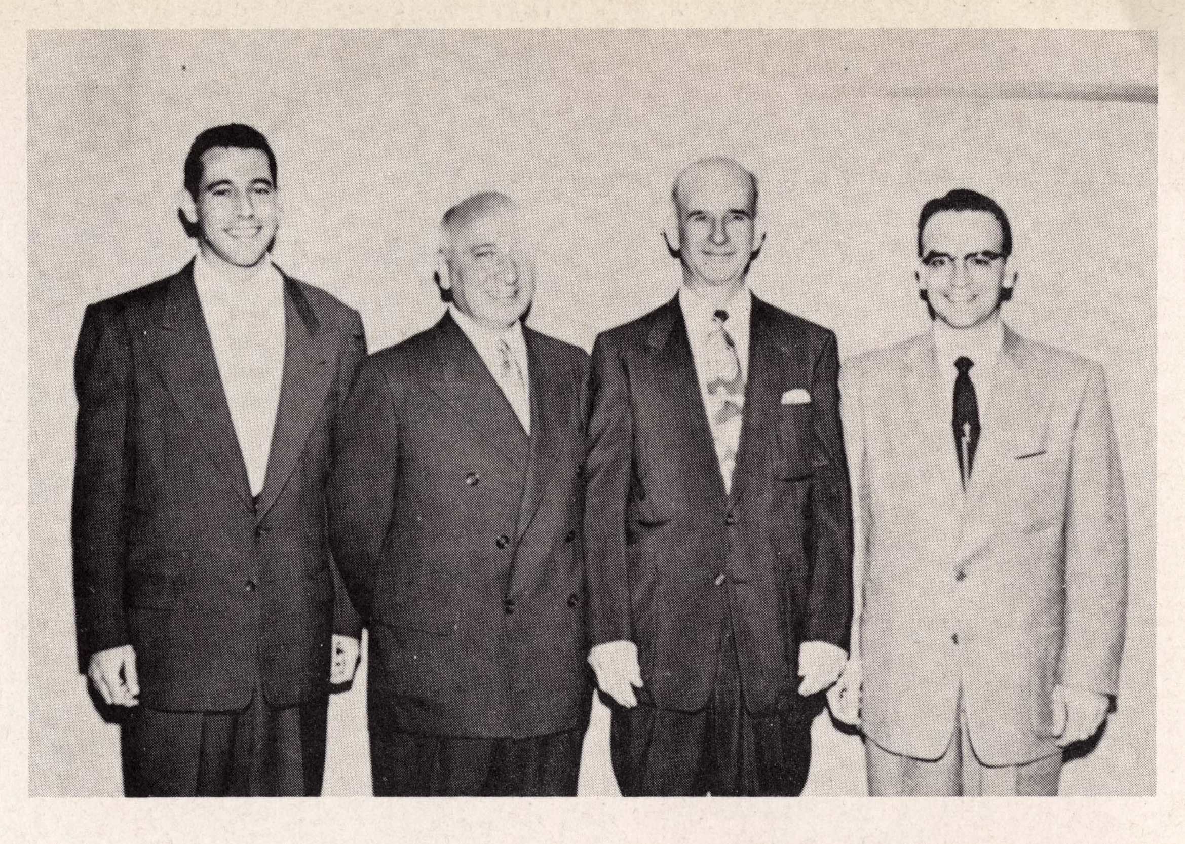 Father and son teams: The Drs. Rizzolo, 1956 and 1925, and the Drs. Williamson, 1925 and 1956; all grads of what was then called Baylor University College of Medicine.