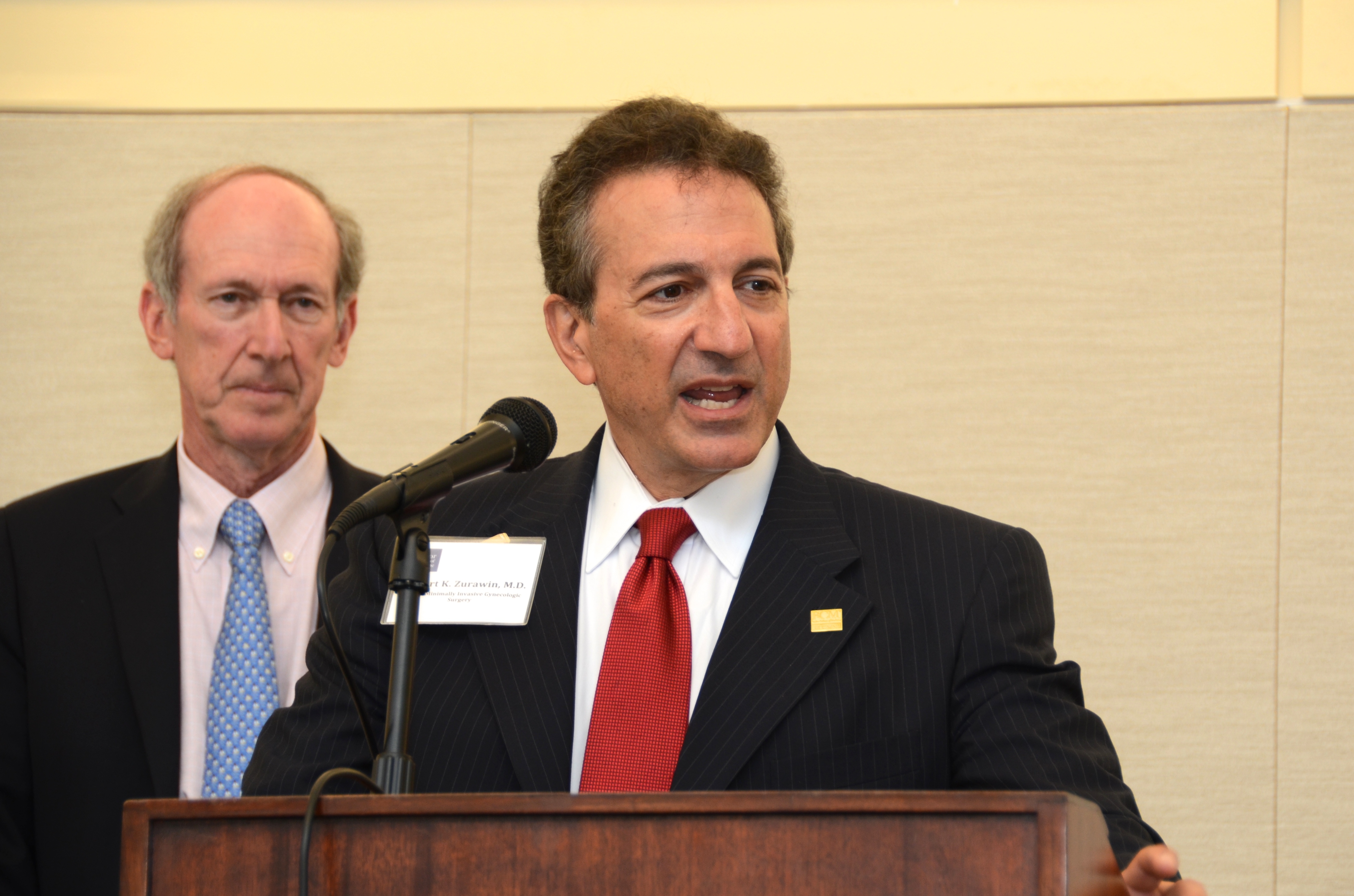 Dr. Zurawin, speaking. Marc Shapiro in background.