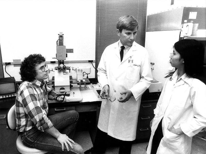 In lab with trainees, including Dr. Timothy Stout, an M.D./Ph.D. student at the time and current chair of ophthalmology at Baylor