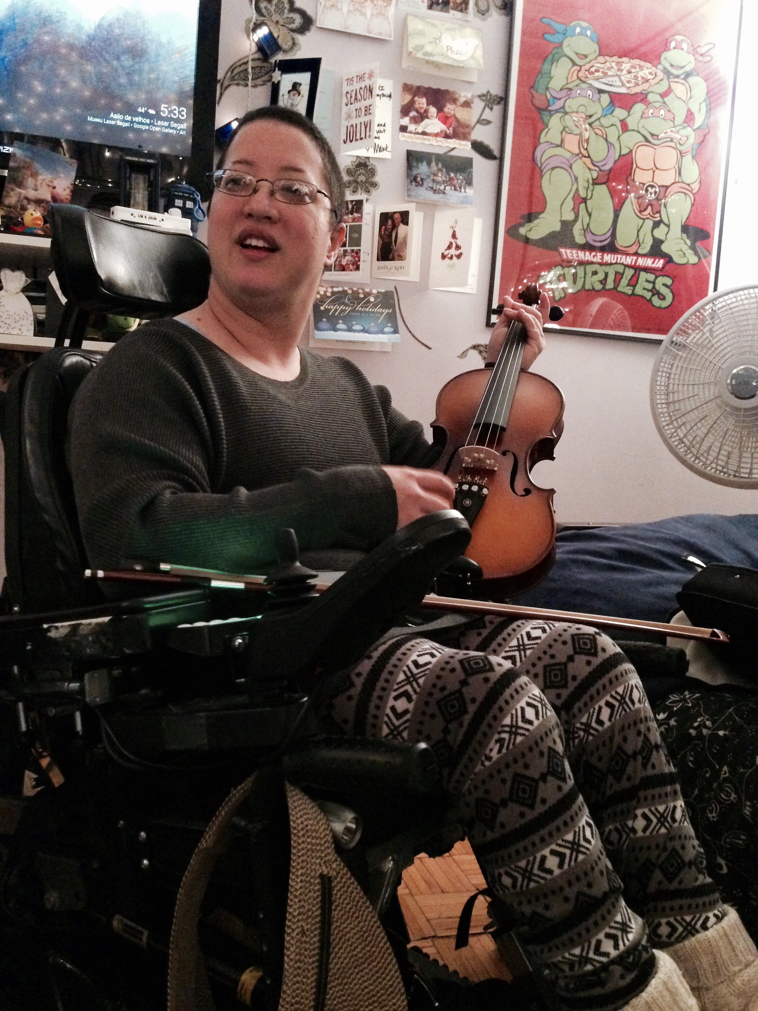 Alejandra Ospina poses with her violin, a new hobby she recently embarked on.