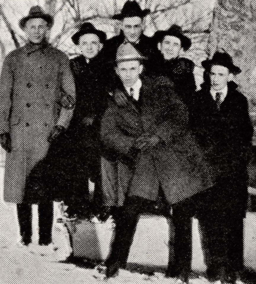 Six men pose for a photo wearing jackets and hats from the 1918 Round Up Yearbook. Courtesy of the Baylor College of Medicine Archives