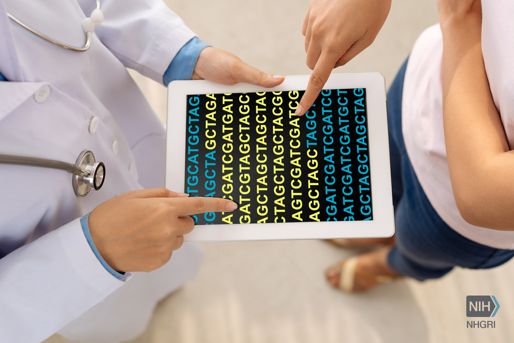 Health professional with a tablet showing genomic data.