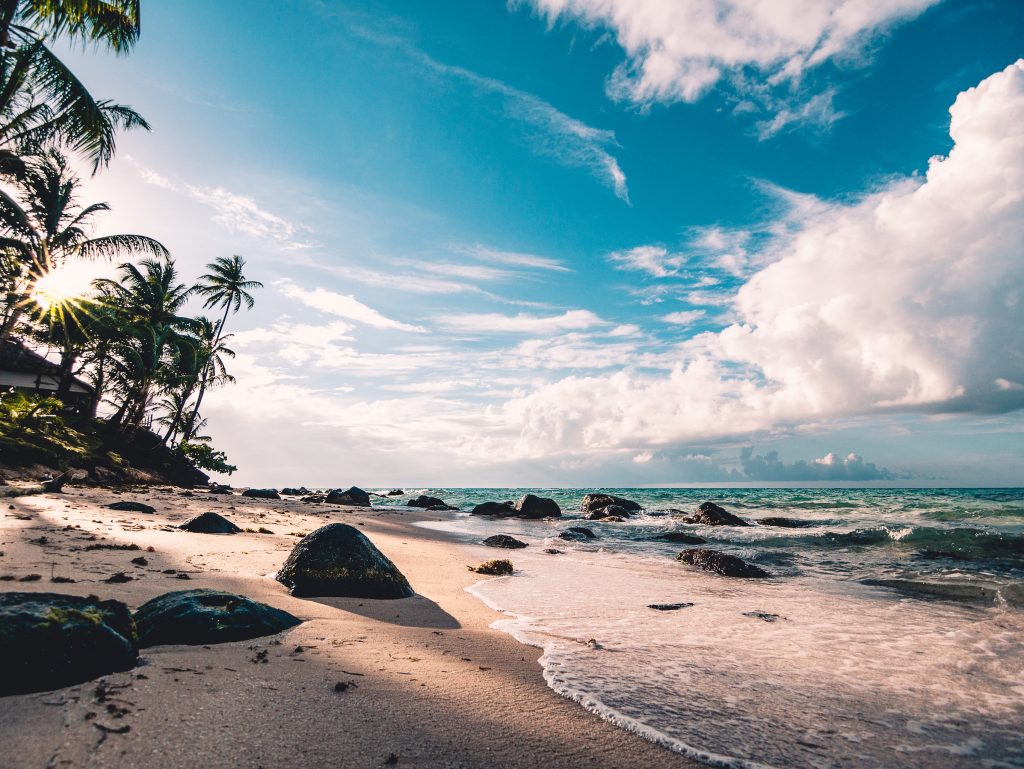 beach-clouds-daytime-994605