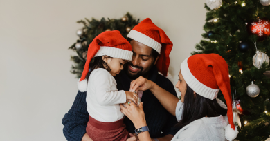 family-decorating-christmas-tree