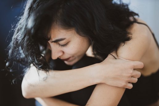 woman-wearing-black-camisole-trafficking