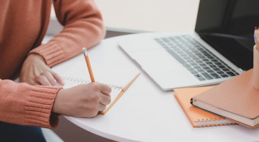 person-writing-on-white-paper-featured