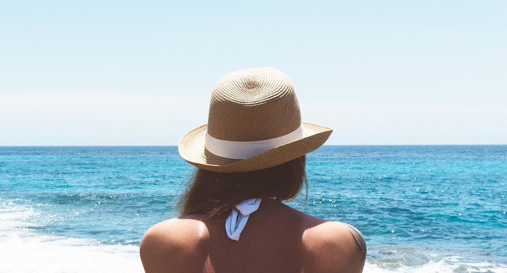 woman-in-hat-at-beach-cropped