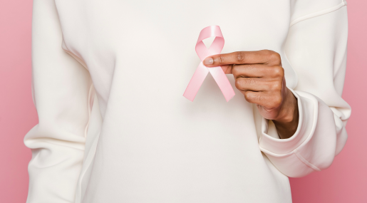 woman-holding-pink-ribbon-breast-cancer