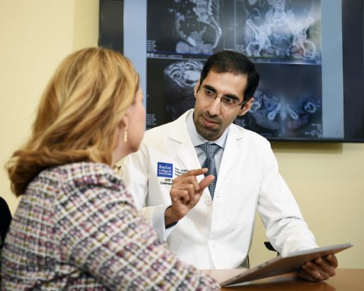 A patient consults with a doctor about colorectal surgery