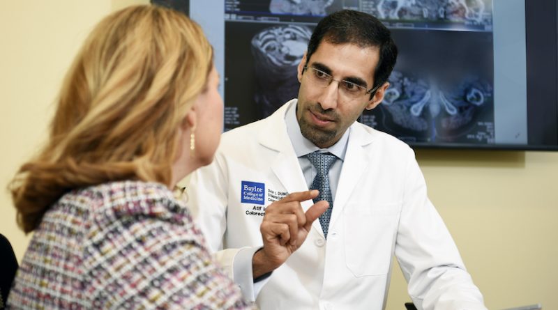 A patient consults with a doctor about colorectal surgery