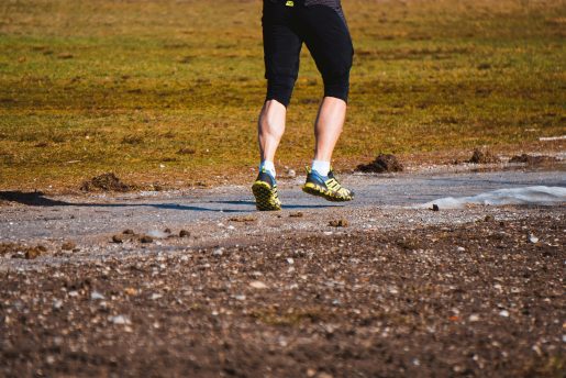 A view of someone running from behind.