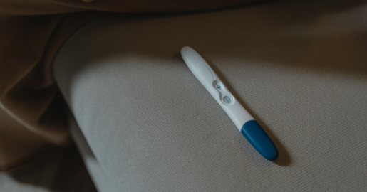 A pregnancy test sitting on a table.