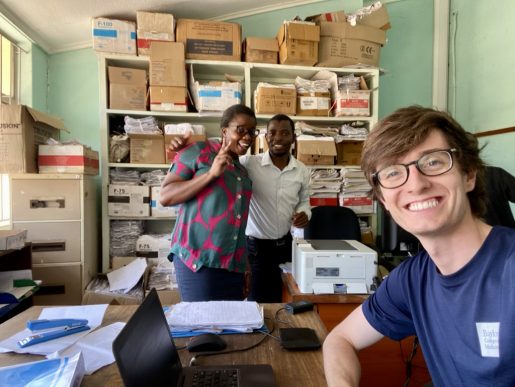 David Holmes holds the camera for a selfie with staff in Malawi at Kamuzu Central Hospital.