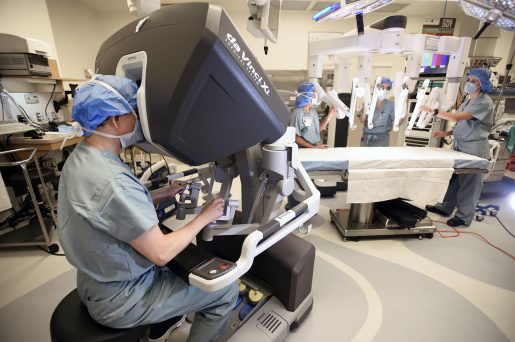 Dr. Kenneth K. Liao using the robotic surgery device.
