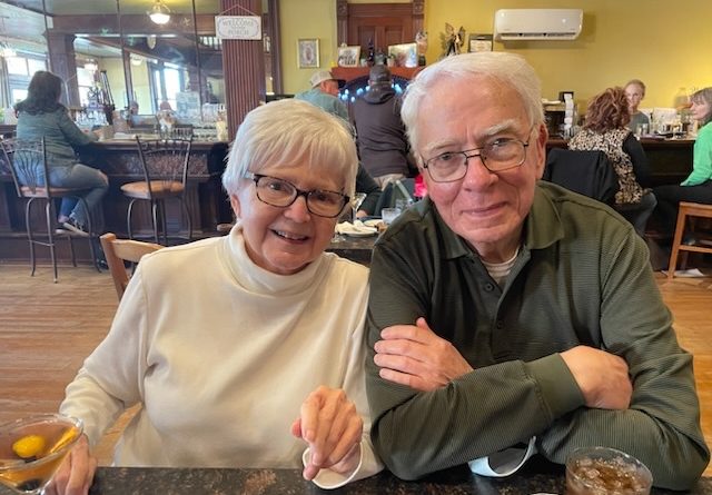 Patient Lolita Slagle with her husband in a restaurant.