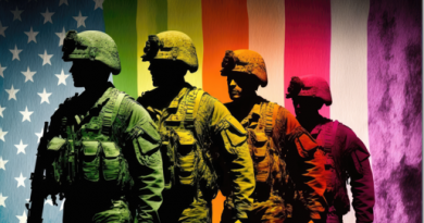 Four military members standing in front of an American flag with rainbow-colored stripes.