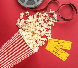 Spilt popcorn and movie tickets