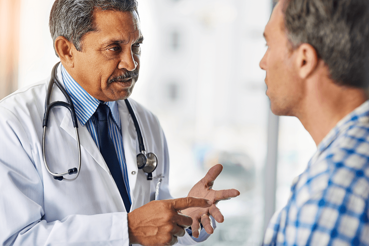 A doctor consulting with a patient.