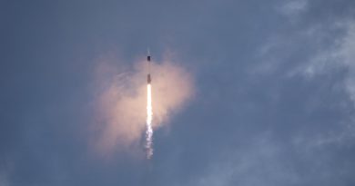 A SpaceX rocket carrying another spacecraft into orbit.