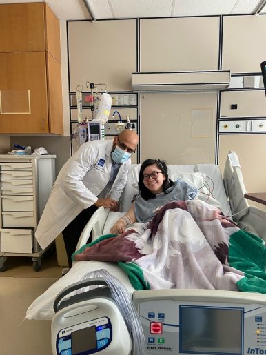 Patient Kailey Ratcliff in hospital bed with Dr. Ganesh Rao