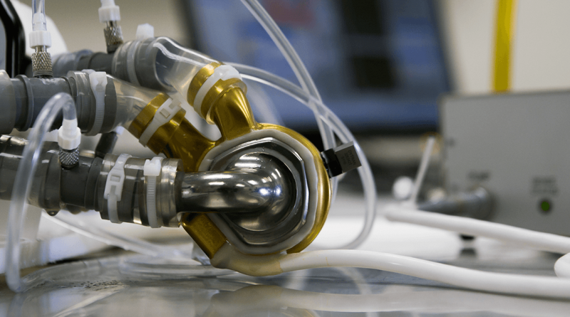 A BiVACOR total artificial heart attached to mock circulation loop for pump hydraulics performance testing.