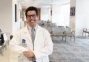 Dr. Jorge Miranda smiling brightly in a waiting room.