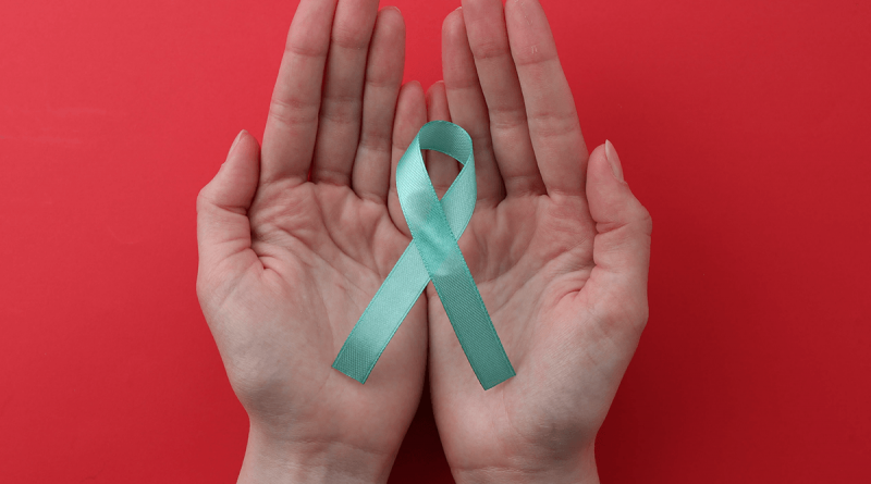 A light blue ribbon held in open hands.