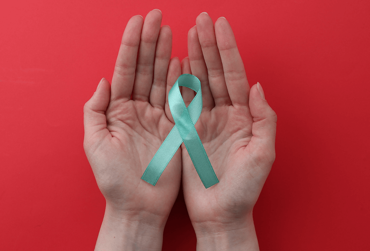 A light blue ribbon held in open hands.