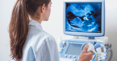 A doctor viewing an ultrasound result.