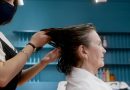 Older woman having her hair cut at a salon.