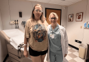 Jessica Wilbourn and Dr. Lauren Barron stand together in an exam room.