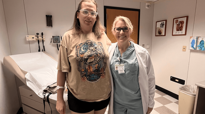 Jessica Wilbourn and Dr. Lauren Barron stand together in an exam room.