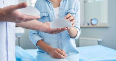 Doctor shows patient implants while patient feels them.