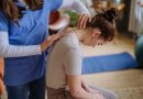 Girl doing back exercises.