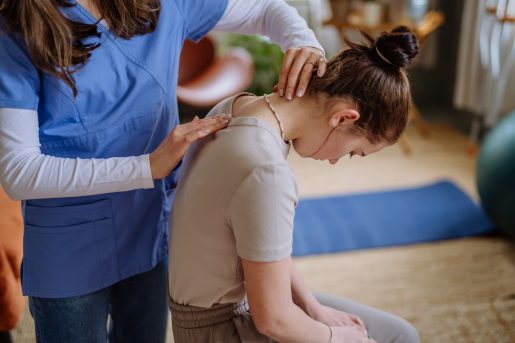 Girl doing back exercises.