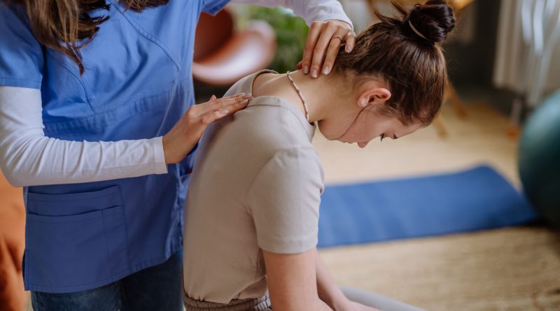 Girl doing back exercises.