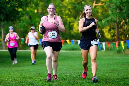 Malignant pleural mesothelioma patient Abigail Philips running with a friend in a race.