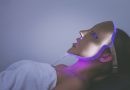 Woman with LED Light Therapy mask on her face.