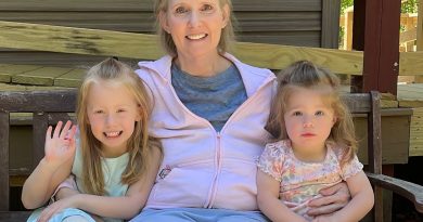 Sandy Tovey with her two grandchildren.