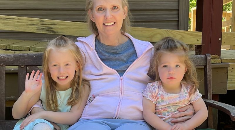 Sandy Tovey with her two grandchildren.