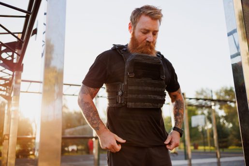 Man wearing weighted vest.