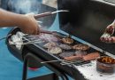Person grilling meat.