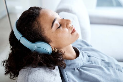 Woman relaxing in headphones.