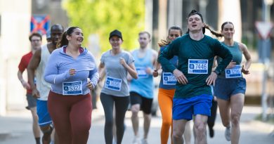 Group of Diverse People Running in a Turkey Trot