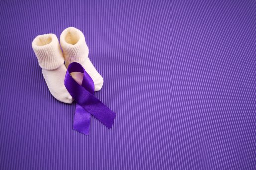 Baby socks and ribbon for Prematurity Awareness Month.