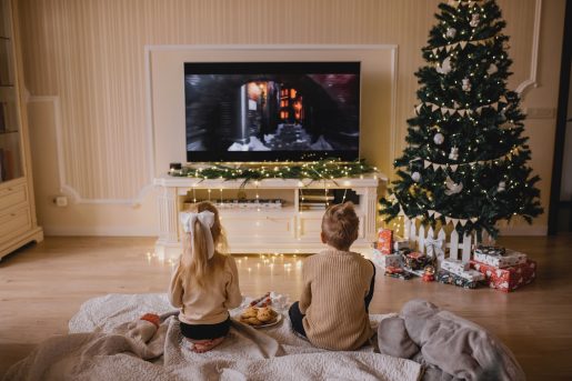 Children watching holiday movies.