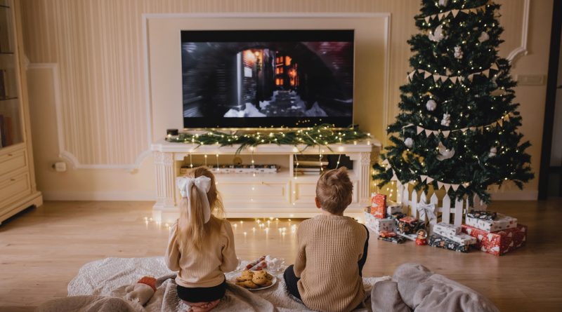 Children watching holiday movies.